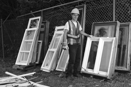 Construction site with organized waste clearance in Palmers Green